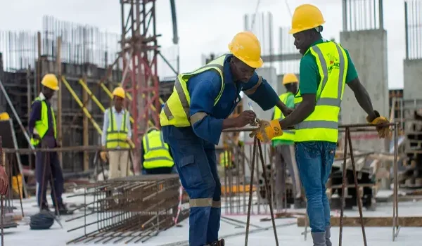 Prestige Electronic City Construction Status — New Launch Stage Site engineers reviewing construction progress, representing the development timeline of a residential project