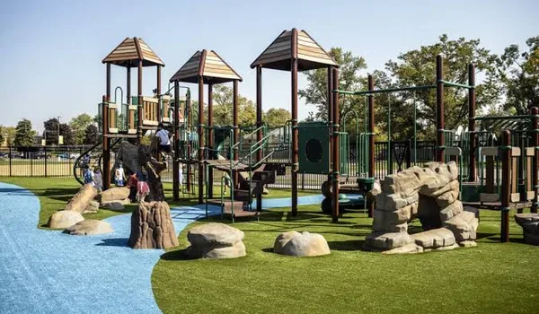 Outdoor children play equipment representing family recreation zones in a residential community