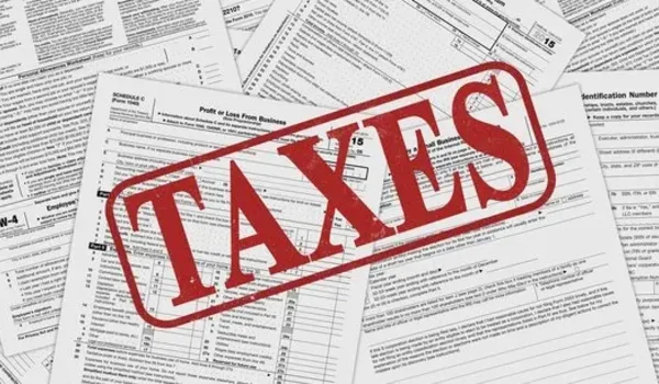 Prestige Electronic City Taxes and Statutory Charges — Buyer Guidance Tax documentation paperwork representing GST, stamp duty and registration charges applicable to an apartment purchase